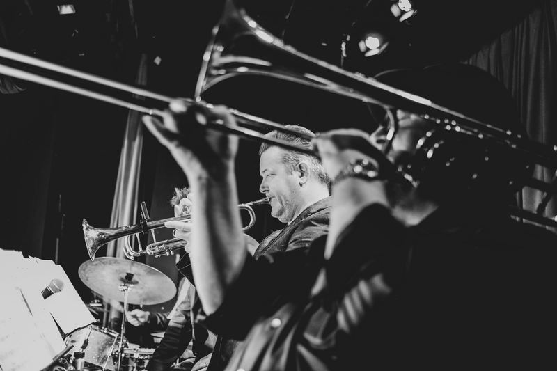 Niel Levonius performing trumpet with a big band, available for corporate events and galas in San Francisco